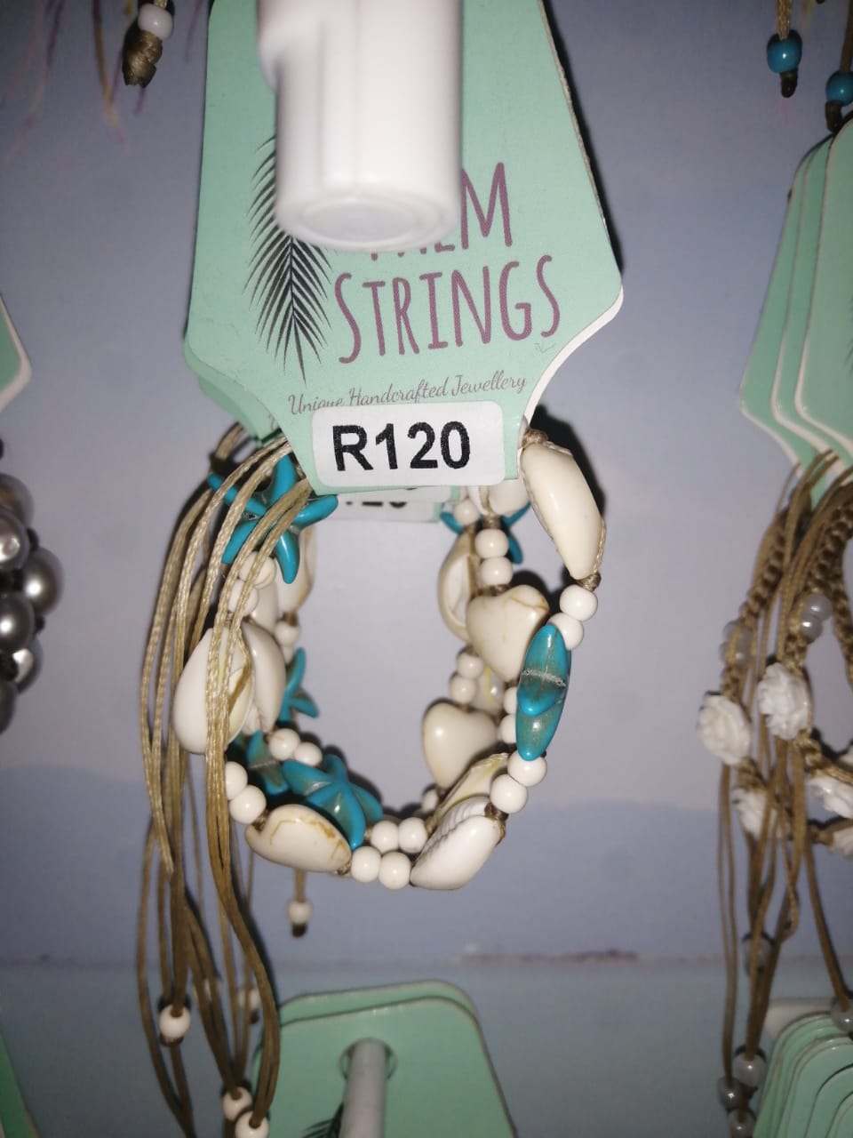 PSB431 Cowrie Bracelet with Turquoise Starfish White Beads